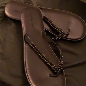 Size 10 brown shiney flip flops
